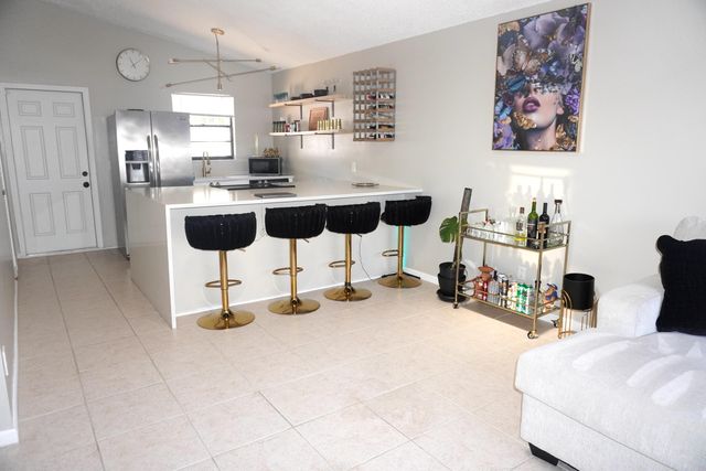 8731 Uranus Terrace, West Palm Beach, FL 33403