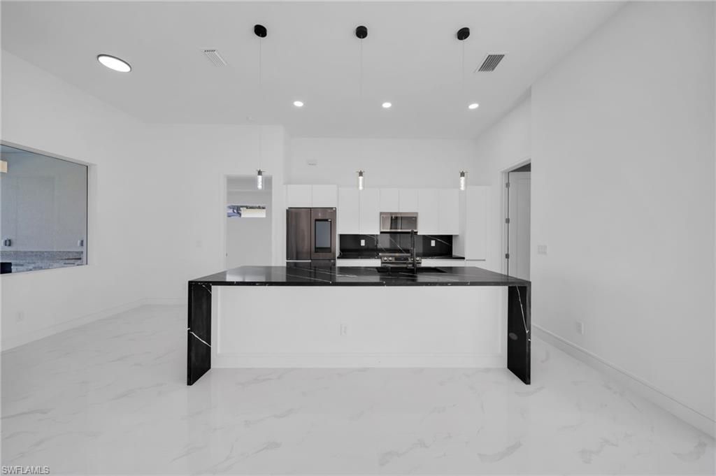 2712 NW 41st AVE, CAPE CORAL, FL 33993 — photo 4