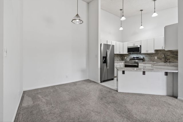 6572 Chasewood Drive F, Jupiter, FL 33458