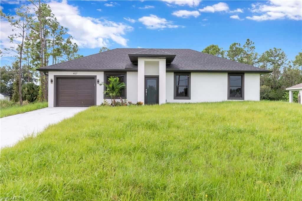 457 Woodman DR, LEHIGH ACRES, FL 33972 — exterior