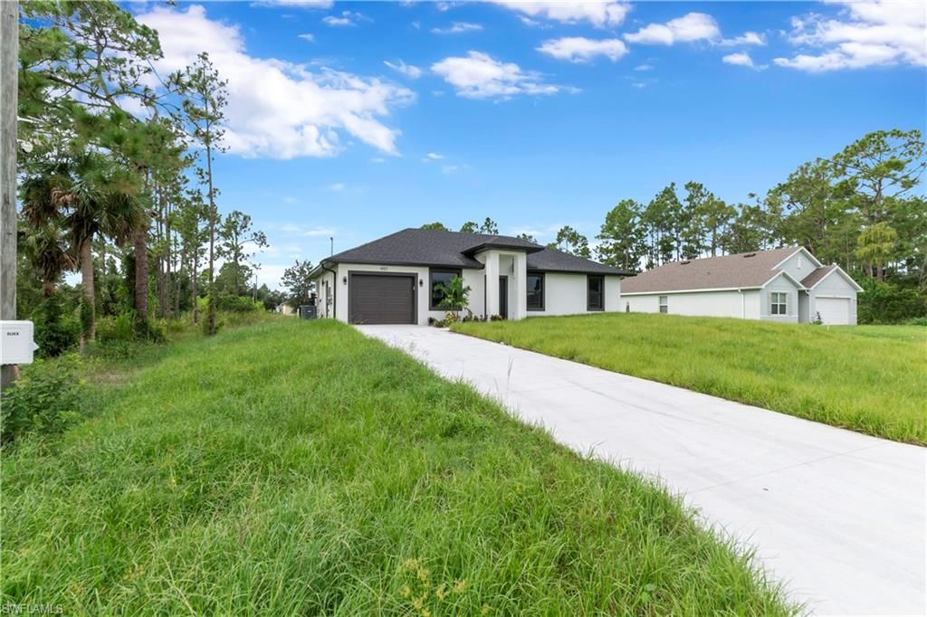 457 Woodman DR, LEHIGH ACRES, FL 33972 — photo 3