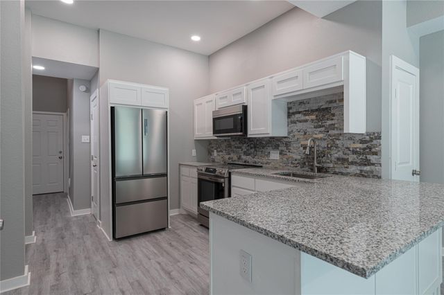 519 Magnolia Point Drive A, Houston, TX 77336