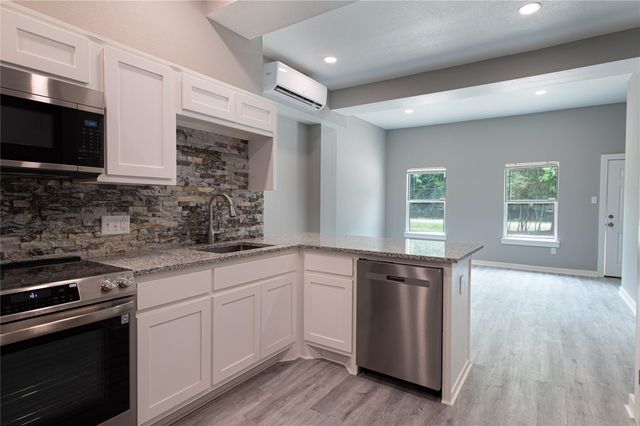 519 Magnolia Point Drive A, Houston, TX 77336