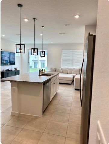 1123 BOARDWALK PLACE, Kissimmee, FL 34747