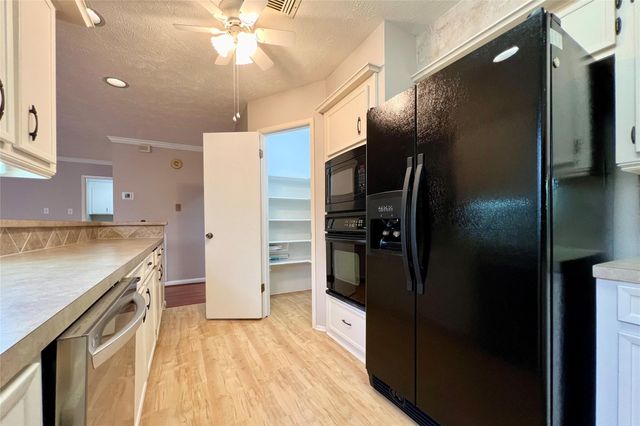 11954 Brook Meadows Lane, Meadows Place, TX 77477
