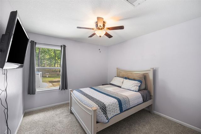 8997 Hickory Road, Plantersville, TX 77363