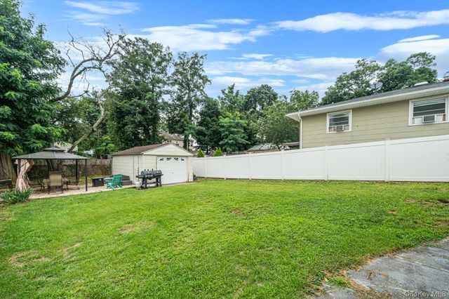 86 Woodycrest Drive, Farmingville, NY 11738