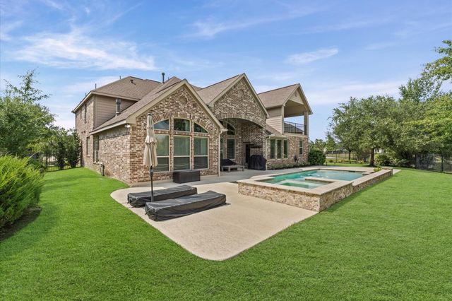 10 Cayuga Pond Court, The Woodlands, TX 77389