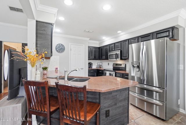 7388 SECRET WOODS Drive, Jacksonville, FL 32216