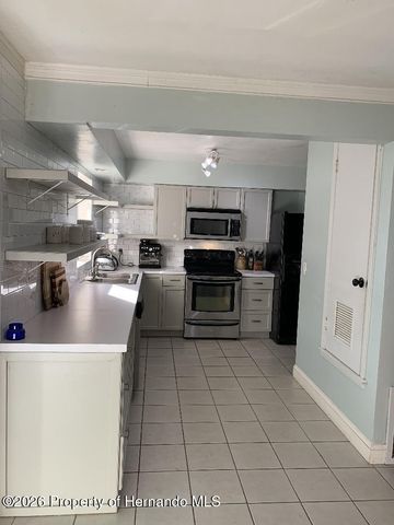 7214 Fireside Street, Spring Hill, FL 34606