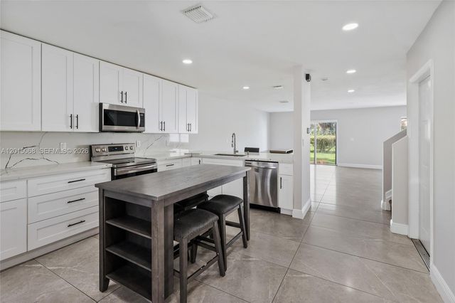 9872 NW 19th Pl, Sunrise, FL 33322