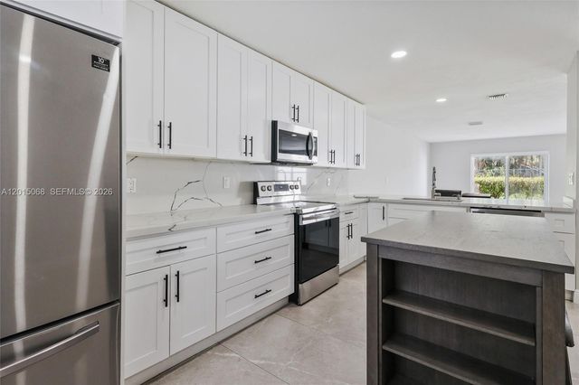 9872 NW 19th Pl, Sunrise, FL 33322