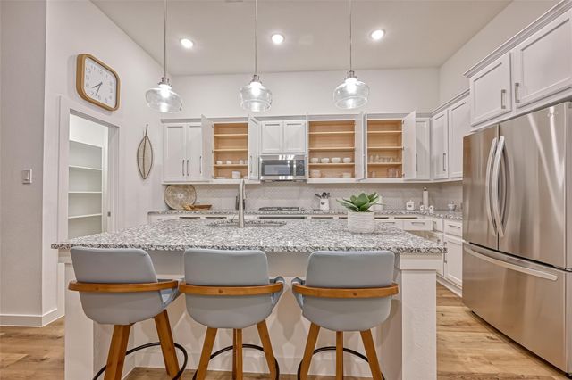 7933 Wild Thicket Drive, Magnolia, TX 77354