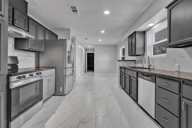 1230 Briar Hollow Lane, Garland, TX 75043