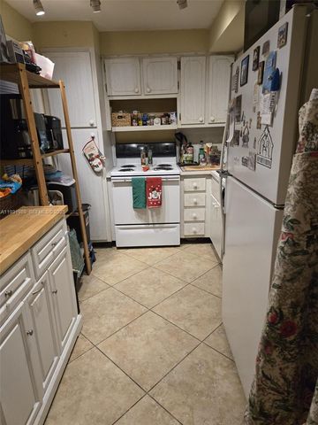 3100 N Palm Aire Dr 102, Pompano Beach, FL 33069