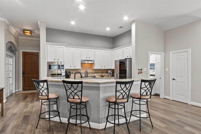 123 Carriage Court, Magnolia, TX 77354