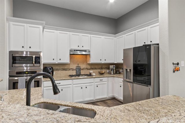 123 Carriage Court, Magnolia, TX 77354