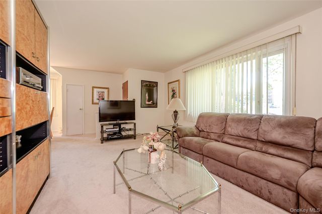 18-11 212 Street 101, Bayside, NY 11360