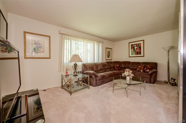 18-11 212 Street 101, Bayside, NY 11360