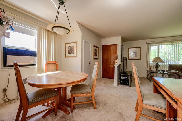 18-11 212 Street 101, Bayside, NY 11360
