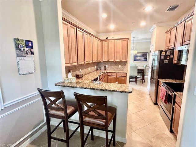 9511 Napoli LN # 202, Naples, FL 34113