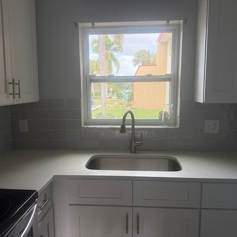 100 Lake Dora Drive, West Palm Beach, FL 33411