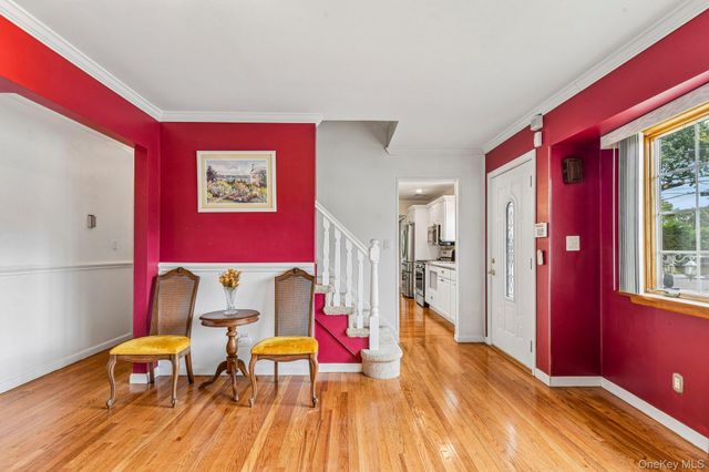 99 Harmony Drive, Massapequa Park, NY 11762