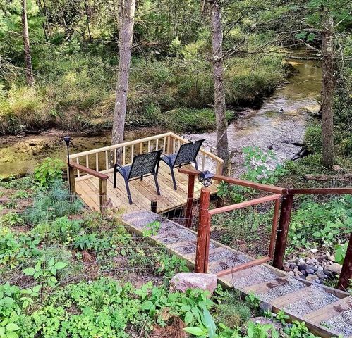 3833 E Creek Wood Drive, Chase, MI 49623