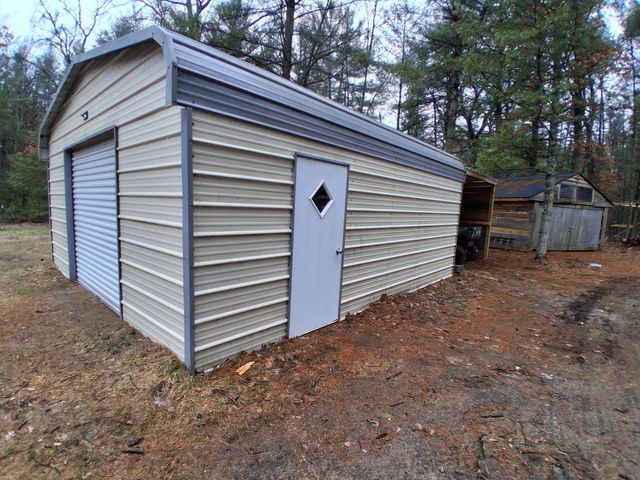 3833 E Creek Wood Drive, Chase, MI 49623