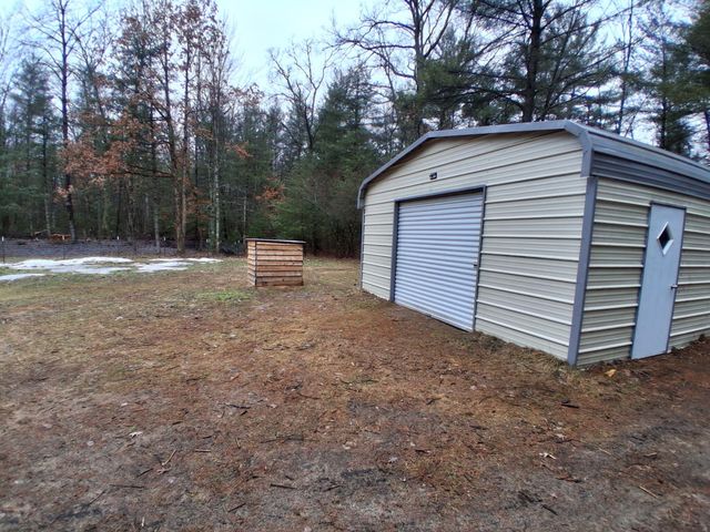 3833 E Creek Wood Drive, Chase, MI 49623