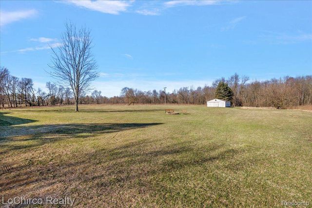 8603 N OWOSSO Road, Fowlerville Village, MI 48836