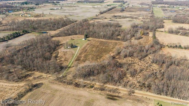 8603 N OWOSSO Road, Fowlerville Village, MI 48836