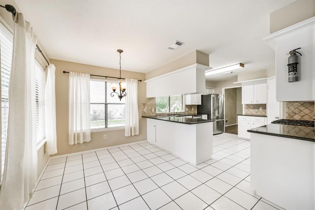 3703 Brook Shadow Drive, Houston, TX 77345