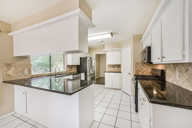 3703 Brook Shadow Drive, Houston, TX 77345