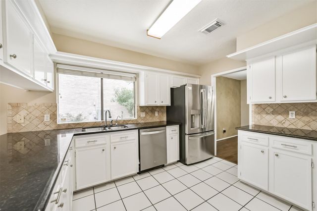 3703 Brook Shadow Drive, Houston, TX 77345