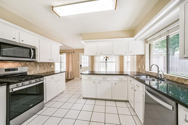 3703 Brook Shadow Drive, Houston, TX 77345