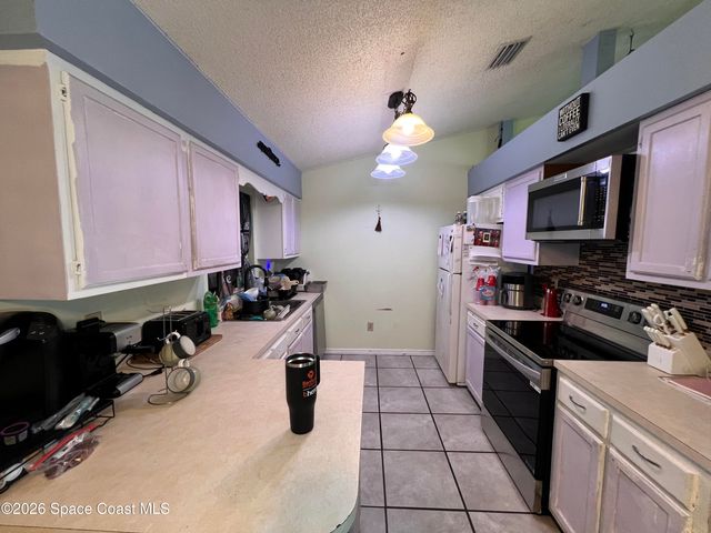 1018 Big Horn Circle NW, Palm Bay, FL 32907