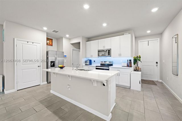 1616 Lindley St, Mangonia Park, FL 33407
