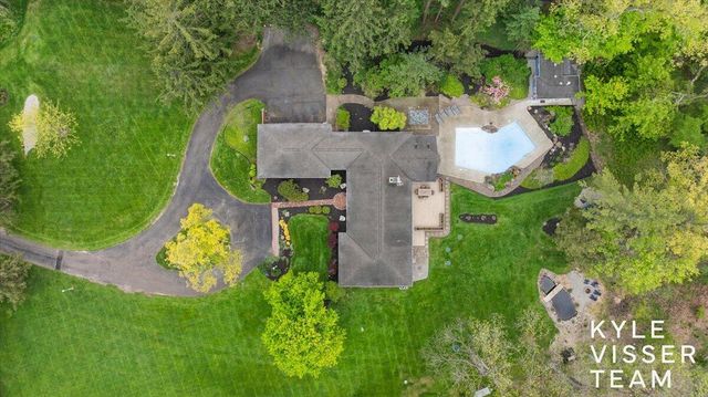 1585 River Oaks Drive, Ada, MI 49301