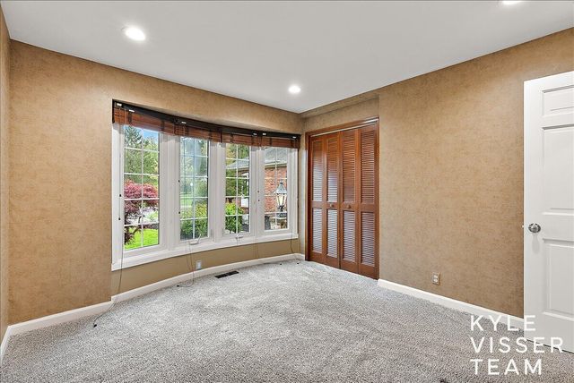 1585 River Oaks Drive, Ada, MI 49301