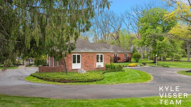 1585 River Oaks Drive, Ada, MI 49301