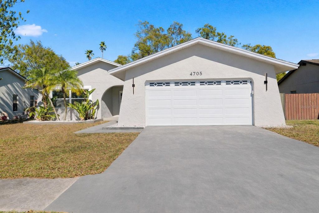 Image 2 of property listing at 4705 CYPRESS TREE DRIVE, Tampa, FL 33624