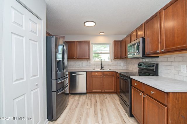 1101 SCHEIDEL Court, Atlantic Beach, FL 32233