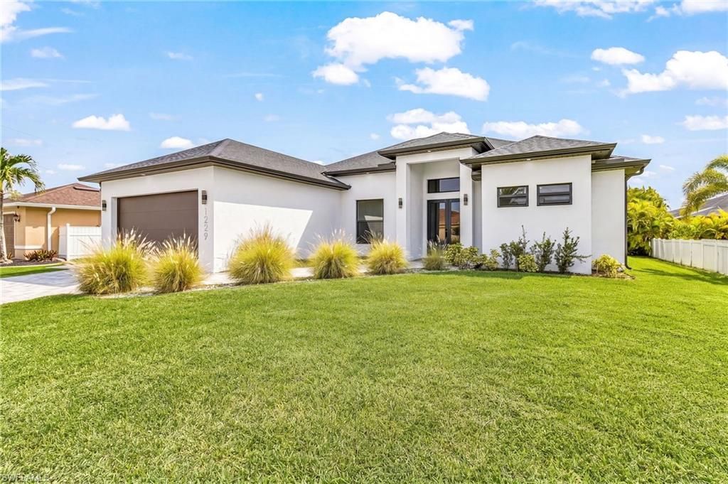 1640 NW 38th AVE, CAPE CORAL, FL 33993 — photo 2