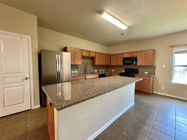 11111 Kingsnorth Drive, Tomball, TX 77375