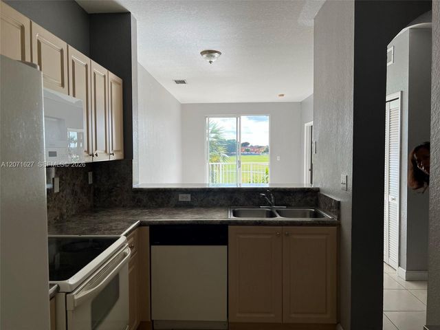 17630 NW 73rd Avenue 203-4, Hialeah, FL 33015
