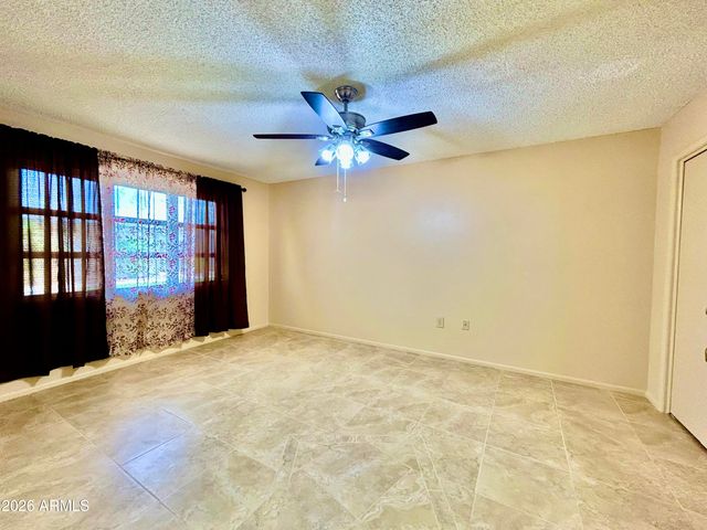 10878 W COGGINS Drive, Sun City, AZ 85351