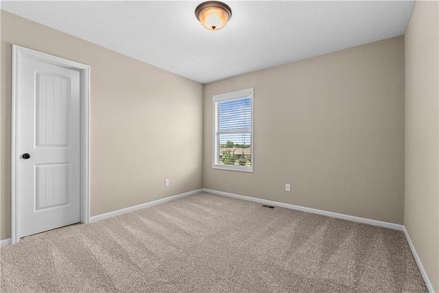 1218 Becket Court, Raymore, MO 64083