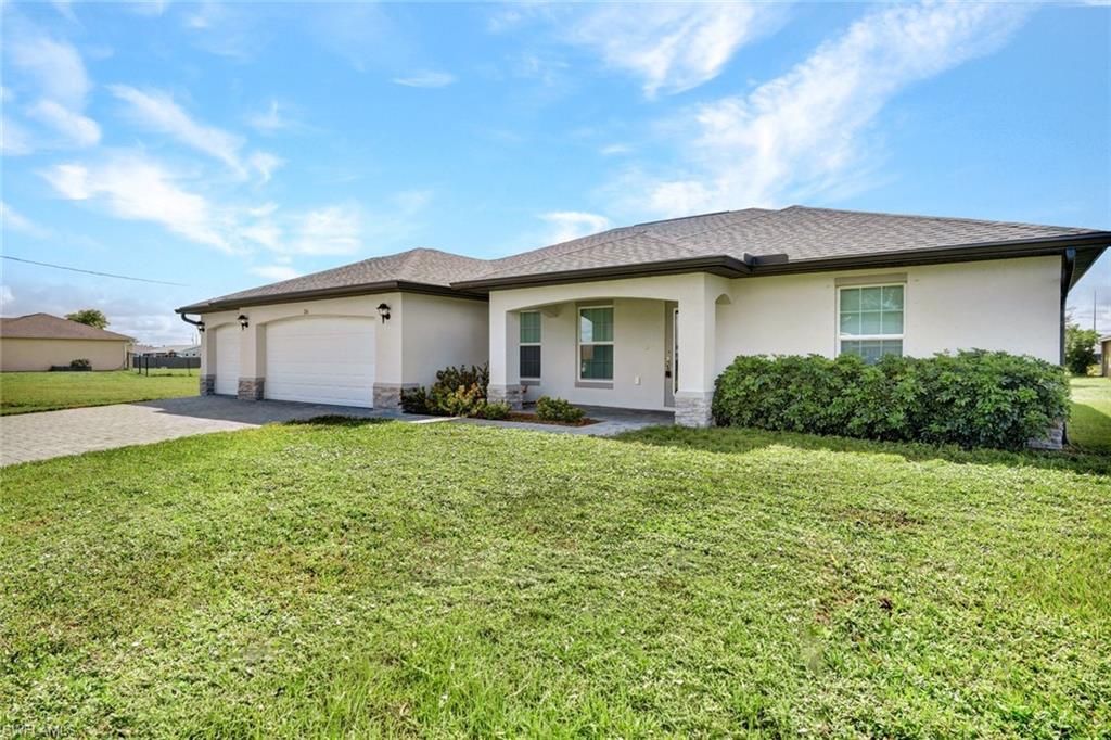 216 NW 9th TER, CAPE CORAL, FL 33993 — photo 2