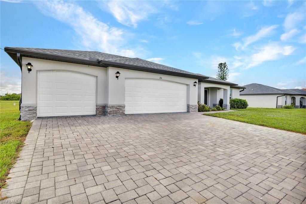 216 NW 9th TER, CAPE CORAL, FL 33993 — photo 3